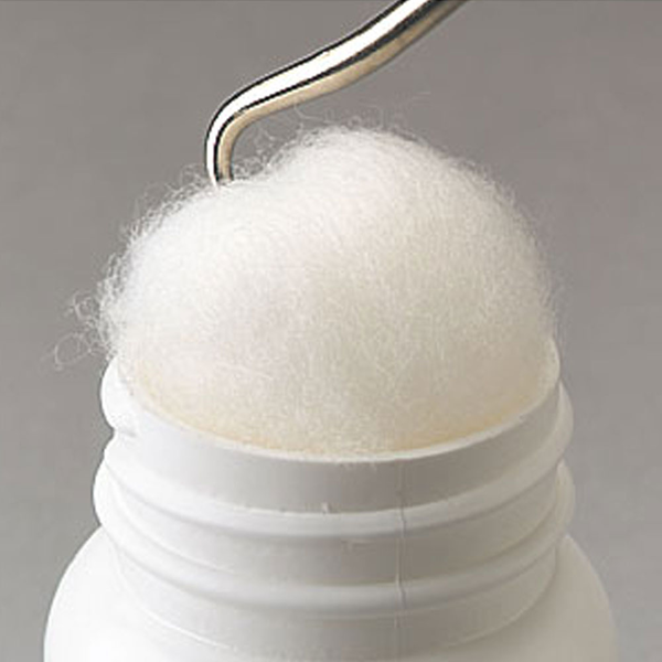 Pulling cotton from pill bottle with the Seal Breaker/Cotton Puller