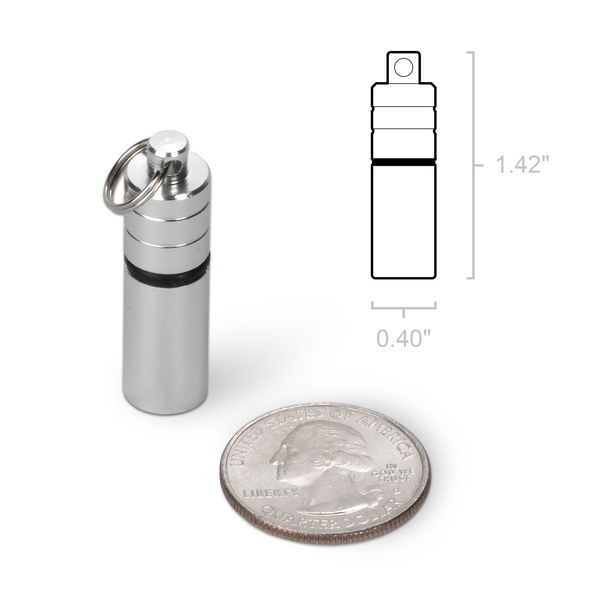 Pill Fob compared to a quarter