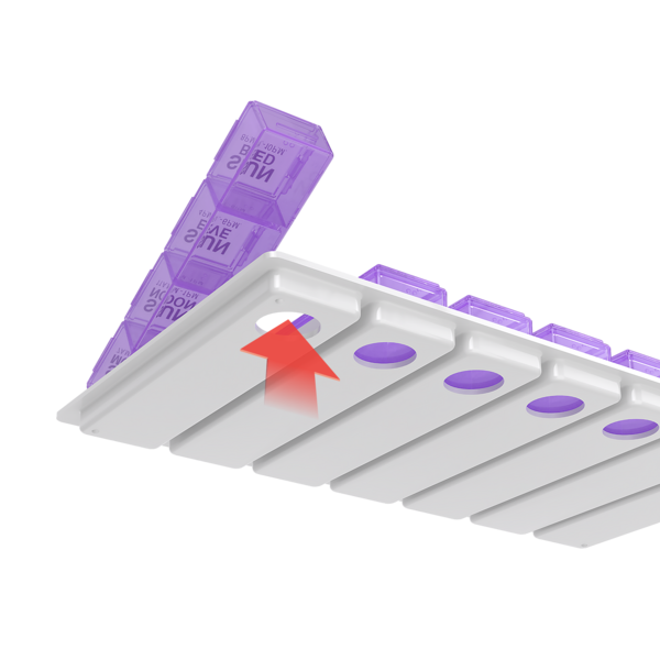 bottom view with push out hole to remove individual planners from Ezy Dose One-Day-At-A-Time Medtime Planner