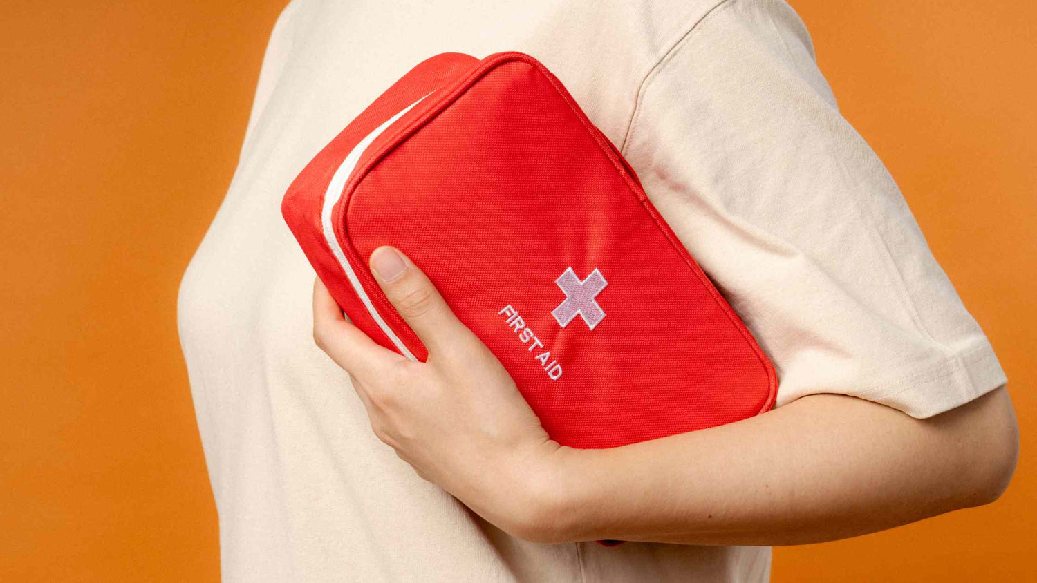 Person Carrying a First Aid Kit