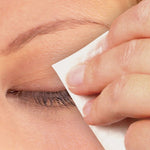 woman using Eyelid Wipes