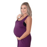Side of pregnant woman wearing purple nursing nightgown