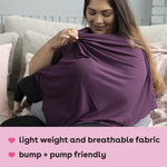 Infograph of woman wearing purple nursing poncho that is light weight and breathable fabric breastfeeding her baby