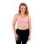 Front of woman wearing pink strappy nursing bra