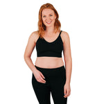 Front of woman wearing black bra for everyday wear